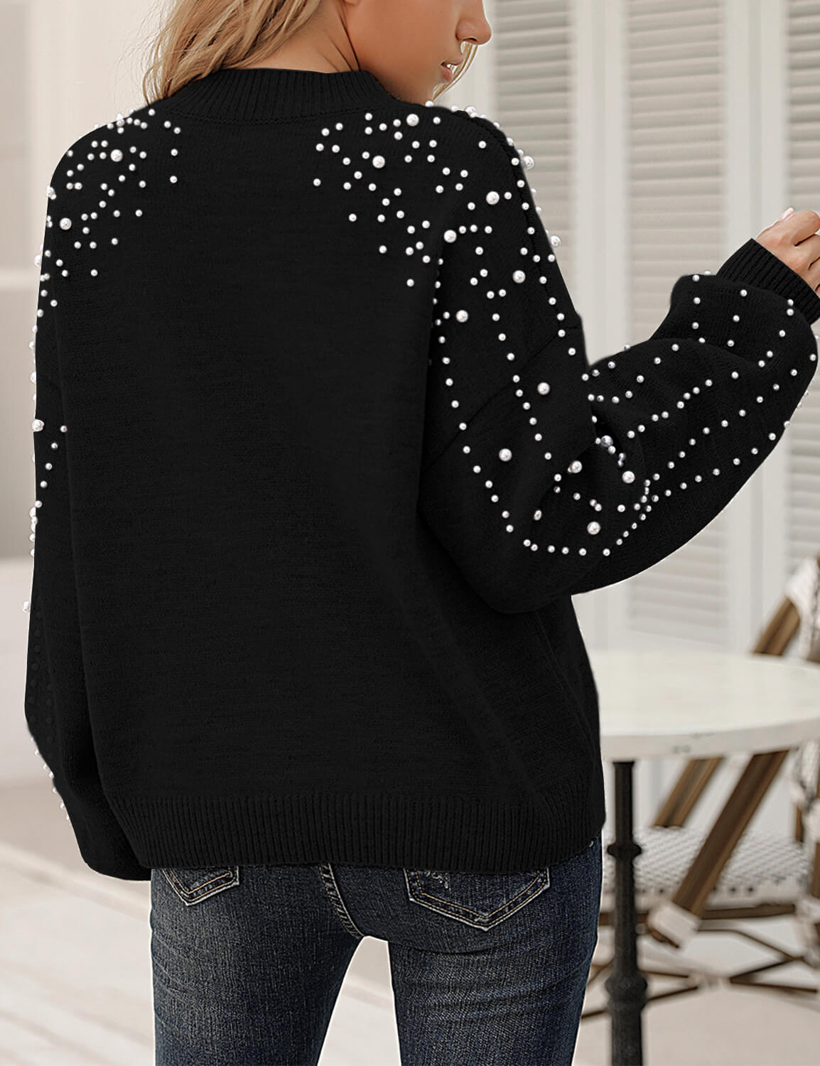 Black sweater with pearls on outlet sleeves