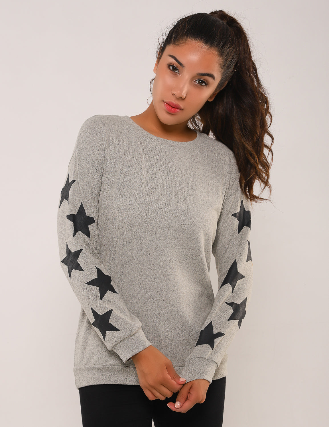 Sweater with shop stars on sleeves